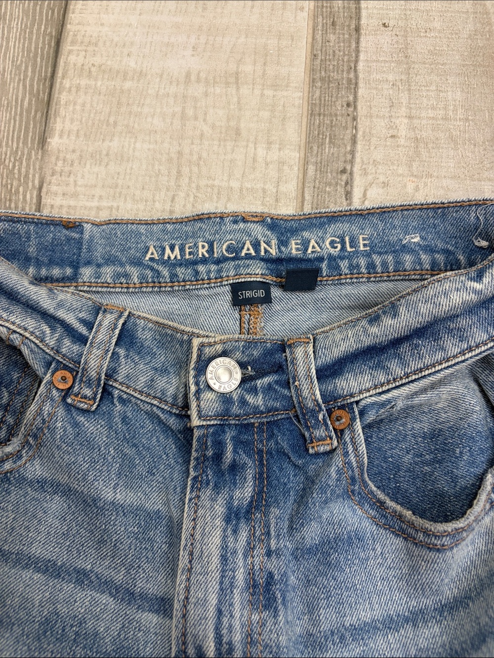 High waisted light wash ripped jeans American eagle